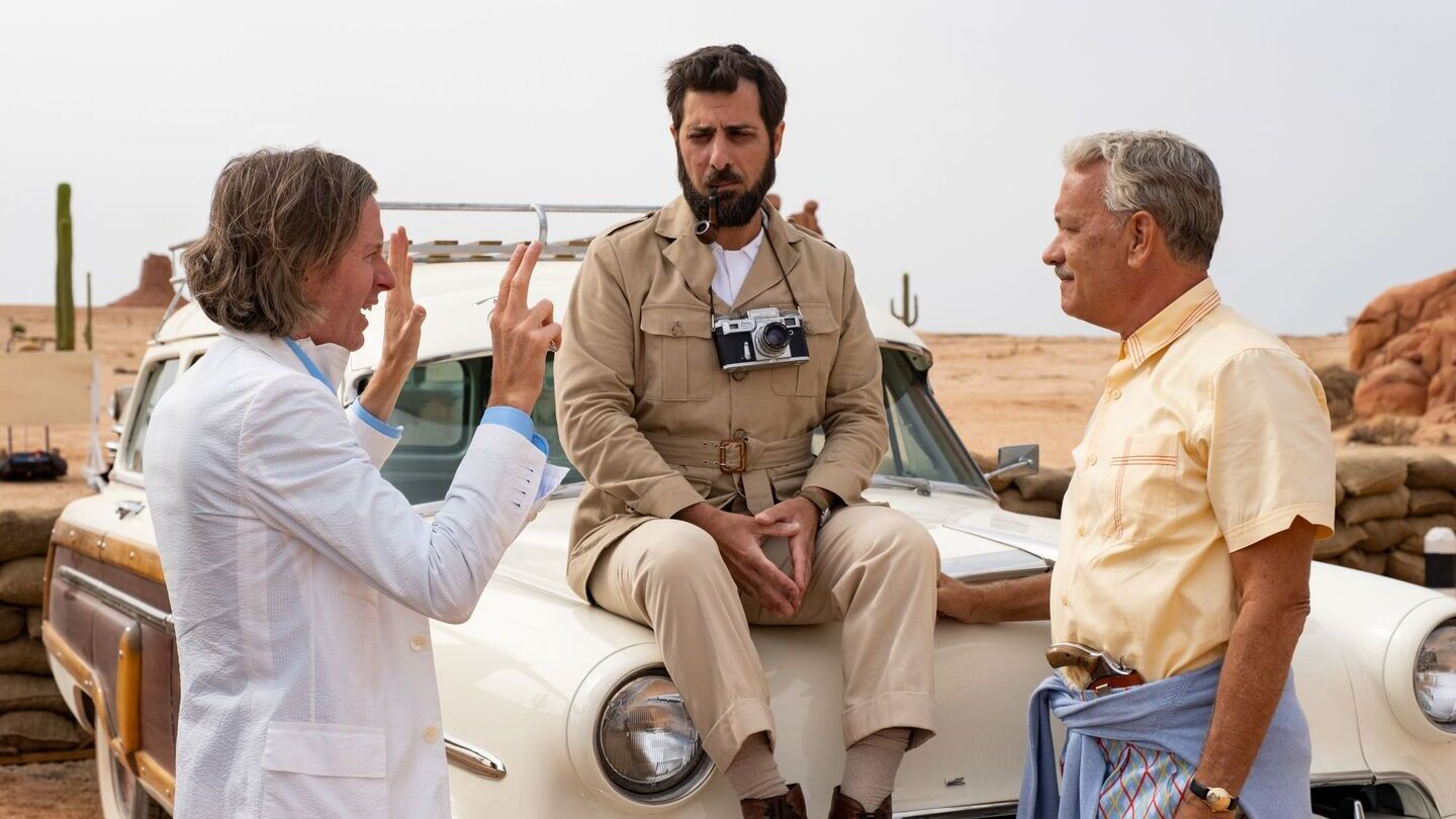 (L-r) Wes Anderson, Jason Schwartzman, and Tom Hanks on set of Asteriod City